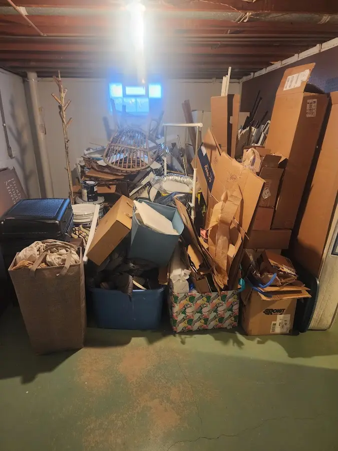 Roll-off dumpster container at job site for 8 Yard Dumpster Rental in Granby